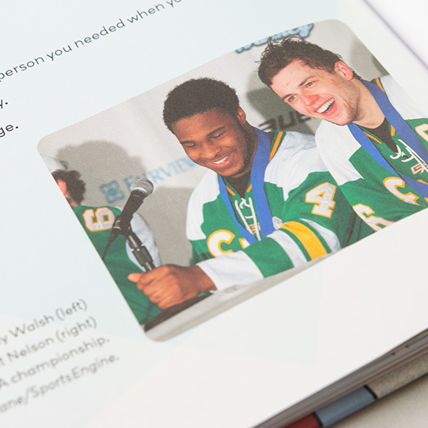 Final page detail includes photo of author Anthony Walsh and his friend Matt after a hockey championship game, both characters in the story