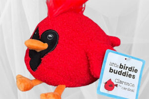 Bright red "Clarence the Cardinal" plush toy, pictured with his "Little Birdie Buddies" tag