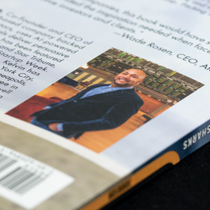 Closeup view of the back cover with shallow depth of field showing the author's headshot